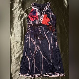 Silk material, purple with poppy flowers.